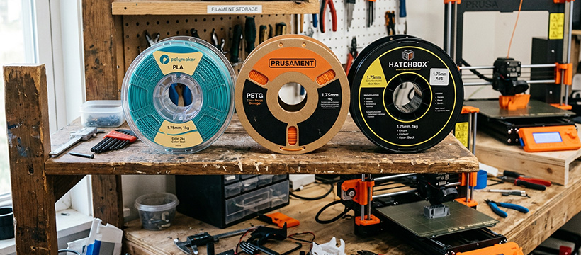 Spools of PLA, PETG and ABS 3D printer filament for gear printing